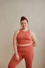 Portrait of a plus size woman in fitness wear
