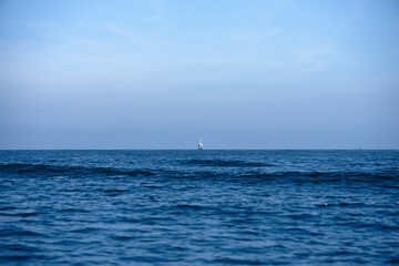Minimal Ocean and sky with mysterious building