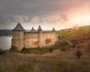 Ancient fortress in Khotin. Castle in Ukraine. A majestic fortification on the banks of the river