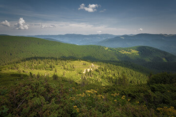 Mountain valley during sunrise. Natural summer landscape