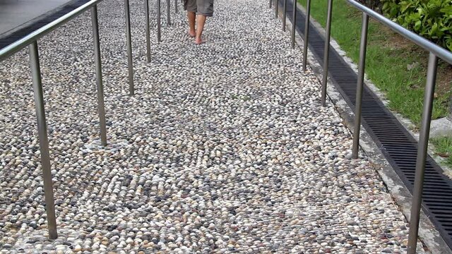 walking on pebble walking trail