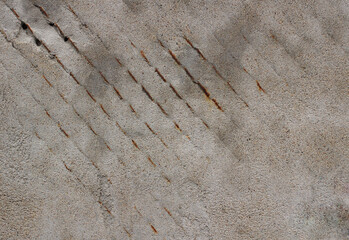 gray background aged with cracks and inclusions