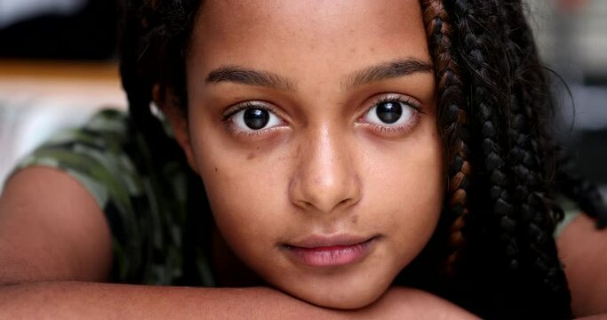 Brazilian adolescent girl smiling. Teenager african descent twelve year old kid