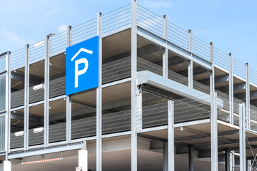 parking sign on a building, steel construction of a parking garage