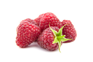 Fresh raspberries isolated on white background. Heap of red raspberries