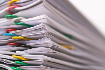 Stack of Group report papers Document.