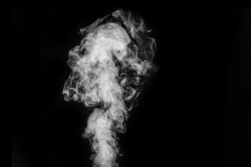 Curly white steam, Fog or smoke isolated transparent special effect on black background. Abstract mist or smog background, design element for your image, Layout for collages.