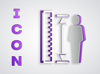 Paper cut Measuring height body icon isolated on grey background. Paper art style. Vector