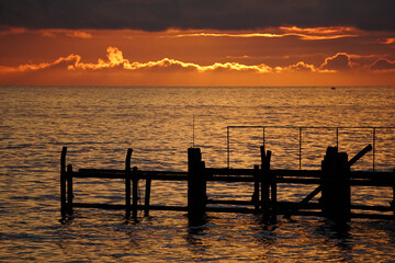 Fototapeta na wymiar Navy pier at sunset cityscape and sea.