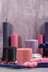 Colored, unusual handmade candles, an element of the interior.