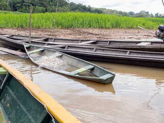 Indian  boats  on the bank of the river