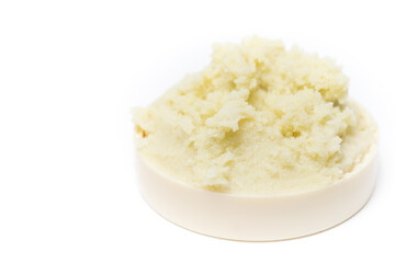 Shea butter isolated on white background, unrefined, close up