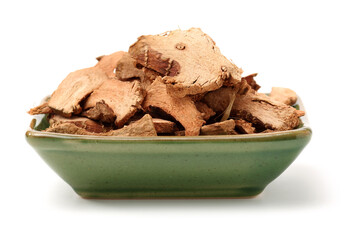 Dried galangal root isolated on white background