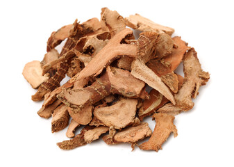 Dried galangal root isolated on white background