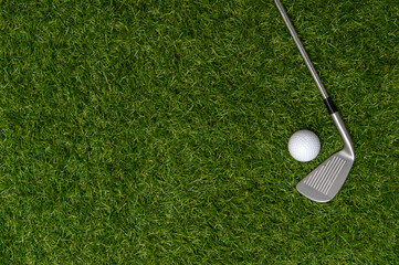 White golf ball and stick on green grass. Horizontal sport poster, greeting cards, headers, website