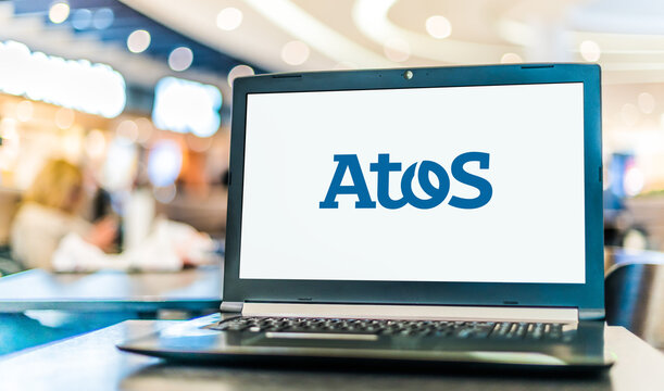 Laptop computer displaying logo of Atos