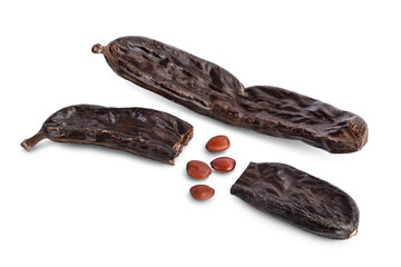 Obraz premium Ripe carob pods and bean isolated on white background with clipping path and full depth of field