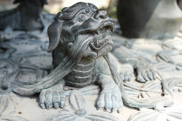Fototapeta na wymiar Cooper sculpture of ancient style dragon