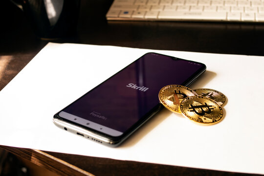 BELARUS, NOVOPOLOTSK -16 MAY, 2021: Phone skrill app and bitcoins