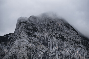 Dark mood -  dramatic clouds and fogs over the mountains and parts with snow