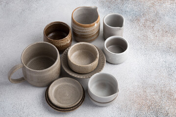 Obraz na płótnie Canvas ceramic tableware, empty craft ceramic plates