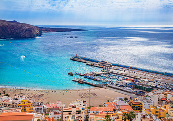 Aerial view of Los Cristianos beach, coast and the ocean in the summertime  in Tenerife island - Spain © cristianbalate