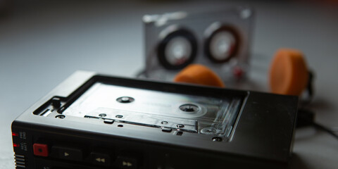 Music listening concept. Vintage cassette tape, audio player and headphones.
