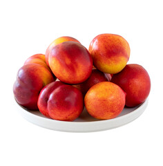 Nectarine on plate isolated on white background