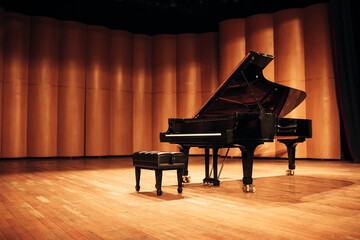 Beautiful piano in concert hall - 433934217