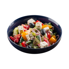 Isolated bowl of fresh greek salad on white background