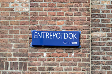 Fototapeta na wymiar Street Sign Entrepotdok At Amsterdam The Netherlands 14-5-2021