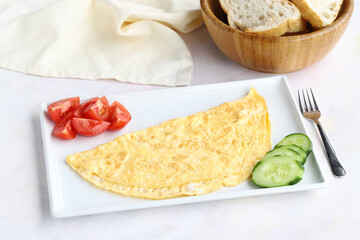 Omelette on wooden background. Local name omlet