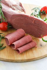 smoked beef tongue on a white background. Local name füme dana dili