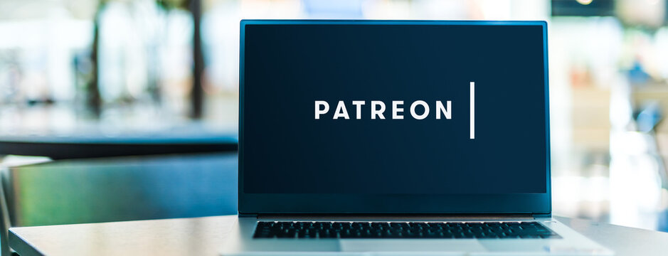 Laptop computer displaying logo of Patreon