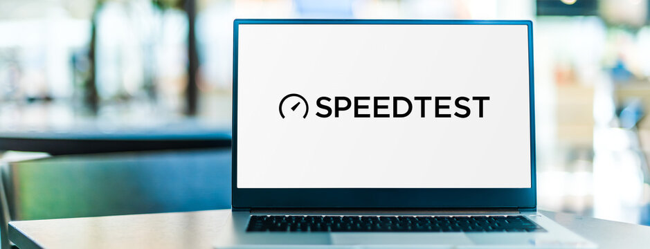 Laptop computer displaying logo of Speedtest