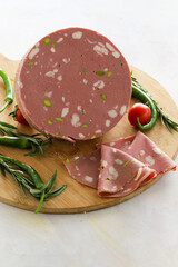 mortadella salami on wooden background