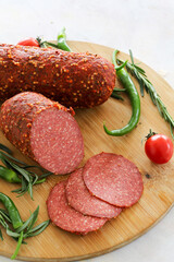 Pepperoni Sausage on Wooden Background