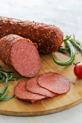 Pepperoni Sausage on Wooden Background