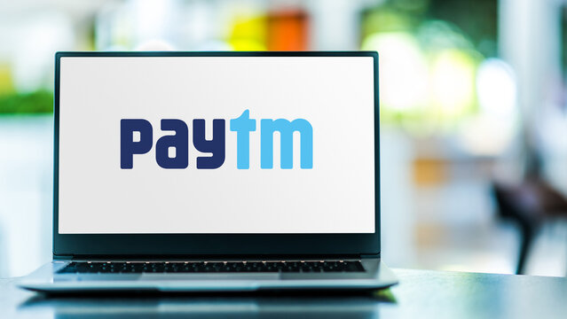 Laptop computer displaying logo of Paytm