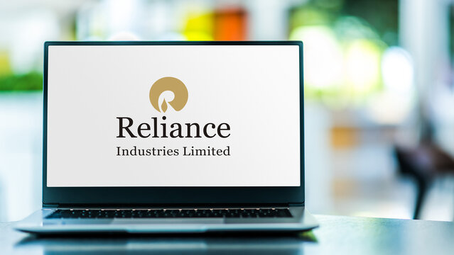 Laptop computer displaying logo of Reliance Industries