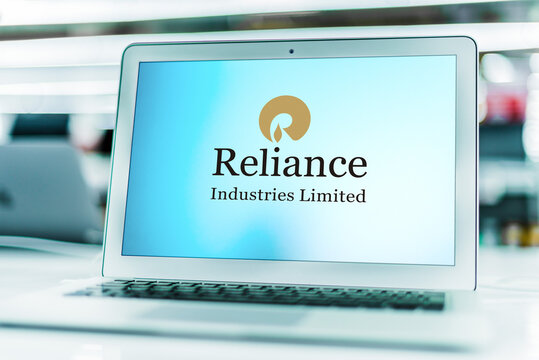 Laptop computer displaying logo of Reliance Industries