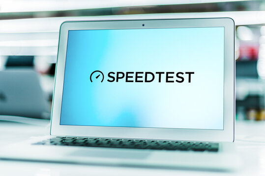 Laptop computer displaying logo of Speedtest