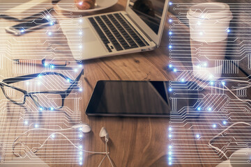 Double exposure of tech theme sketch over cell phone background. Concept of technology