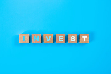 Text on square wooden blocks, investment concept ideas
