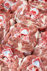 fresh neck of lamb on white wooden background. Close up meat