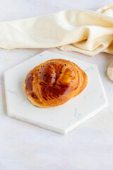 feta pastry on a white wooden background. Local name peynirli açma
