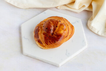 feta pastry on a white wooden background. Local name peynirli açma