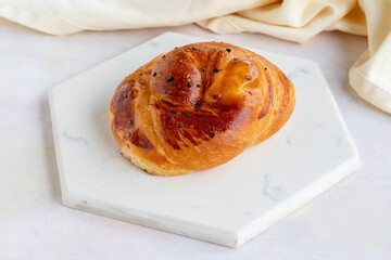 Cheese pastry on a white wooden background. Local name peynirli açma