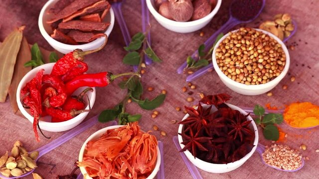 Spices and herbs in white bowls,indian Exotic Gourmet Food Ingredients: incl Turmeric,spice for the Indian curry,garam Masala,tandoori Masala,
