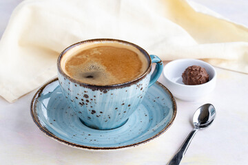 Filter coffee on white wooden background. Local name filtre kahve